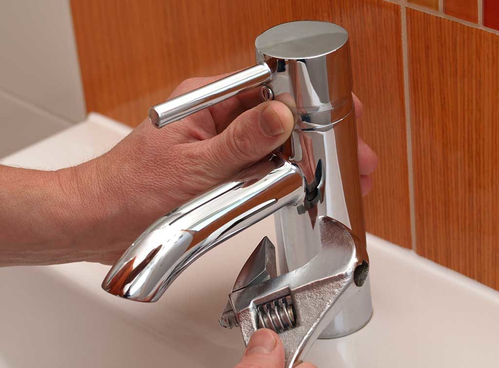 fixing dripping tap