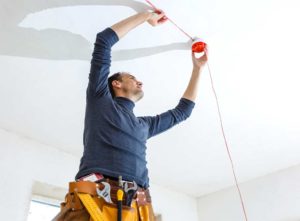 Fire alarm system being installed
