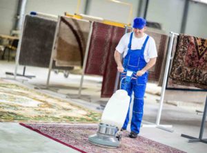 Oriental rug being professionally cleaned