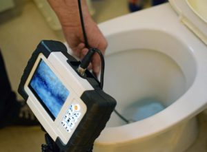 Unblocking toilet with a camera