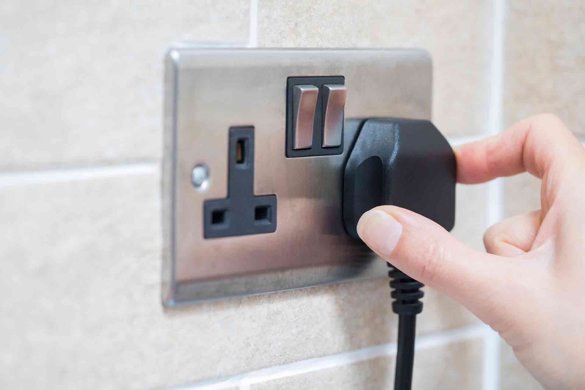 Adding a plug socket to a room cost