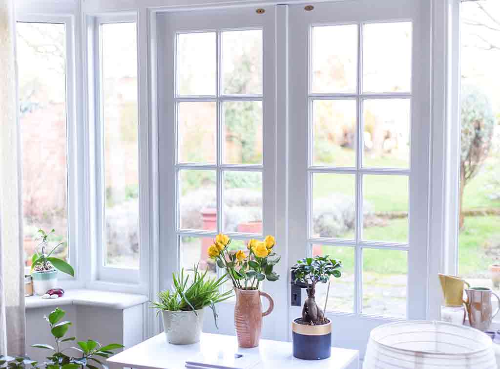 cost of replacing window with french doors
