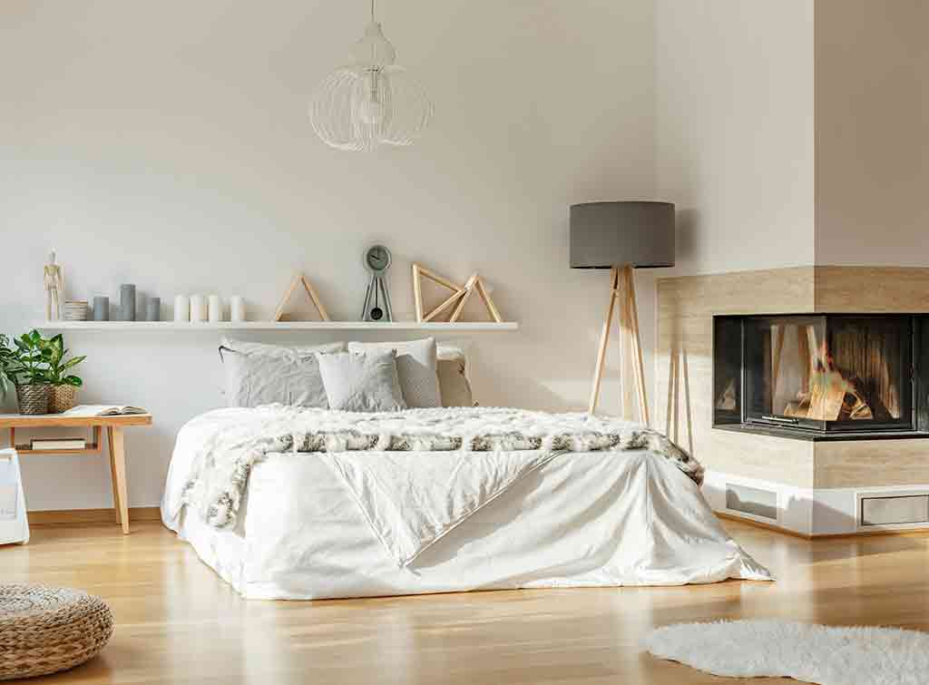 Corner chimney breast idea in bedroom