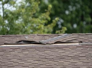 Broken roof from wind damage