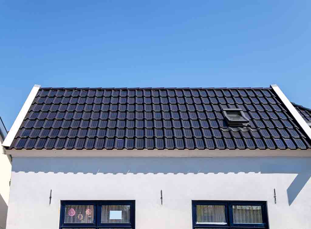 Solar roof tiles price – panels on house