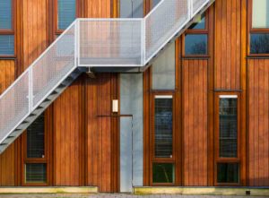 Timber sash windows on wooden clad building