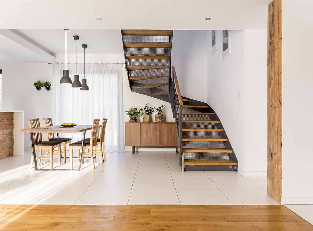 Stairs in open plan dining space