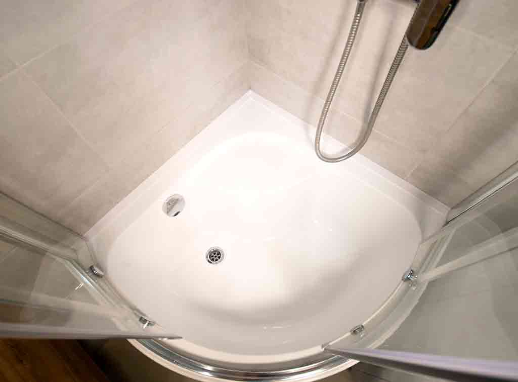 Curved shower tray