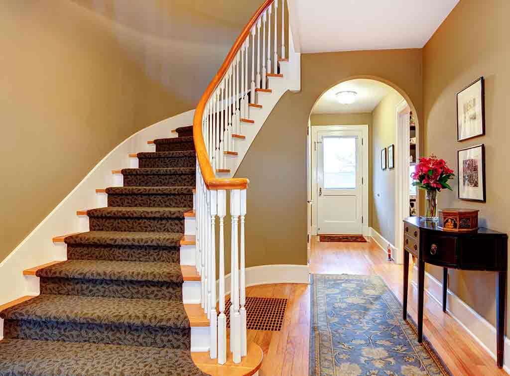 Modern hallway ideas with stairs and sage paint