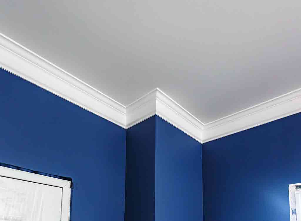 Painted coving between wall and ceiling