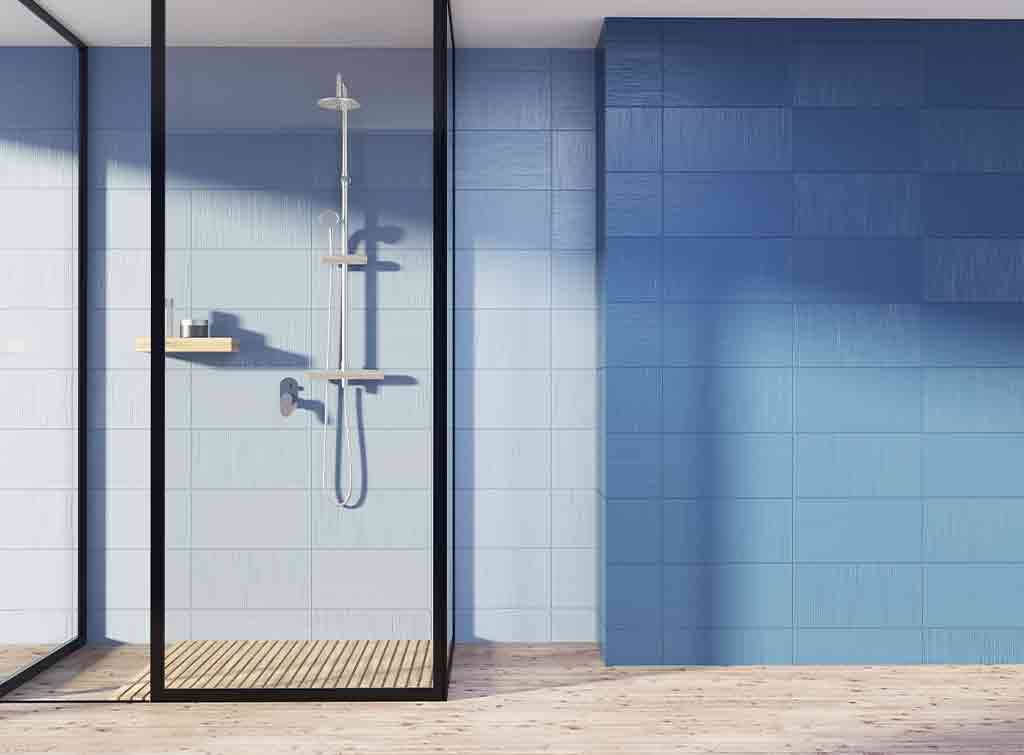Shower tray in blue bathroom