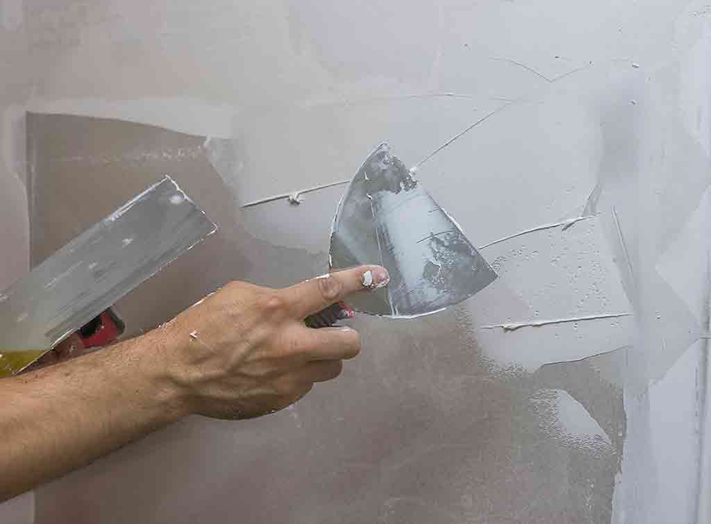 how to fill holes in wall
