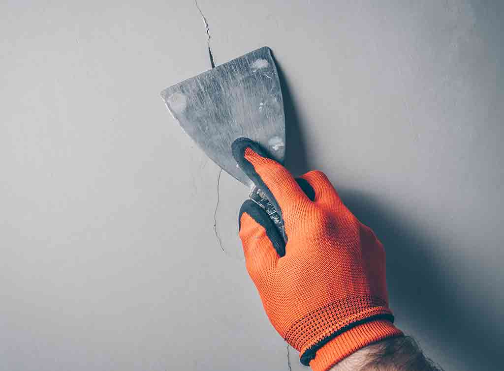 how to repair deep cracks in plaster walls