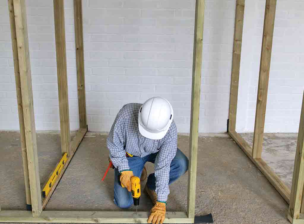 Attaching stud wall to the floor