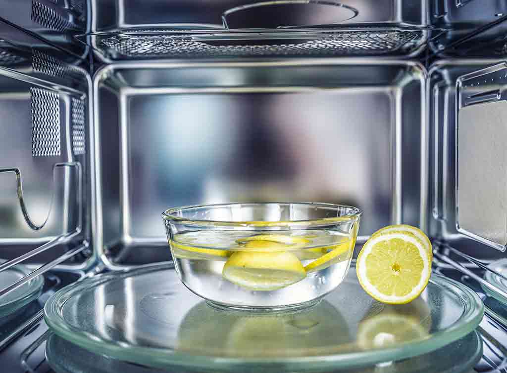 Cleaning a microwave with lemon