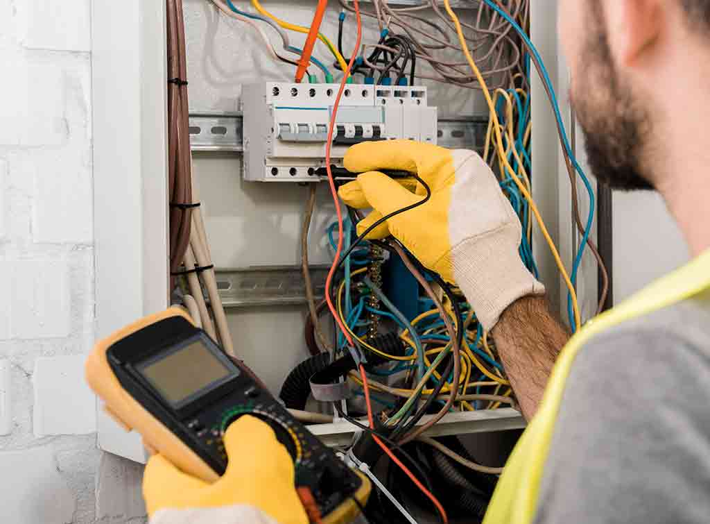 Electrician checking property