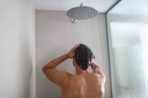 man having a shower