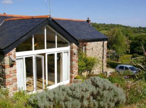 Single storey extension ideas on large house in countryside