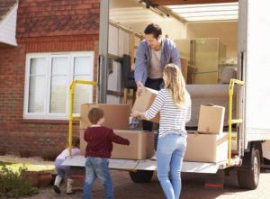 Moving house checklist - people loading up a van