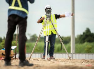Land surveyors carrying out field work