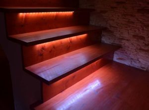 Basement staircase lights in red and white