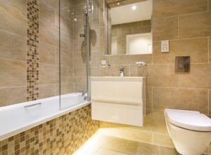 Bath panel coordinated with wall design - Cheap small bathroom remodel ideas bath panels
