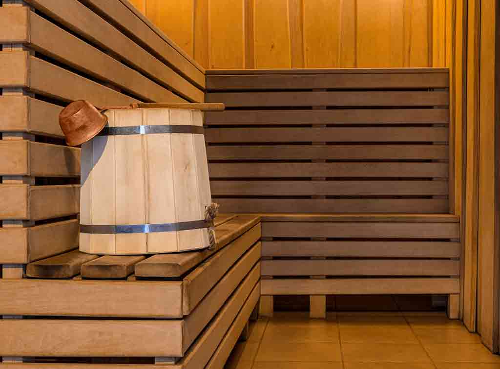 Sauna with wooden plank benches