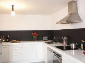 Grey painted kitchen splashback