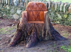 Tree stump chair with armrests