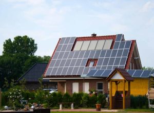 Energy efficiency: solar powered house with roof panels