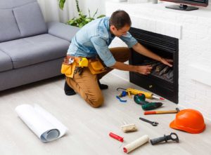 Tradesman building a fireplace