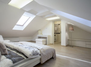Large loft conversion bedroom with en suite bathroom