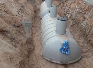 A large septic tank being installed