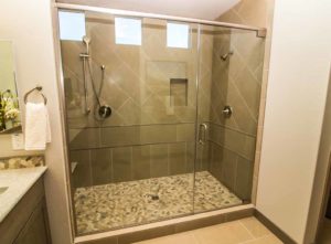 Small walk in shower room with neutral decor