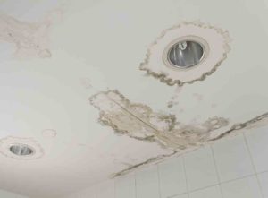 Ceiling with downlight and water damage