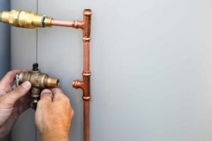 How to fit a thermostat to a hot water cylinder