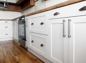 New cupboard handles in kitchen