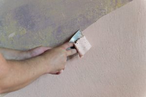 Removing paint from a wall using Nitromors