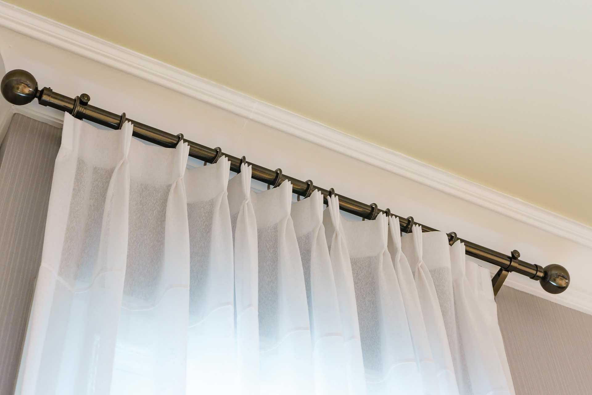 How To Put Up Curtains Nets Pleats Eyelet Checkatrade