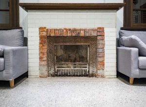 White paint on brick fireplace