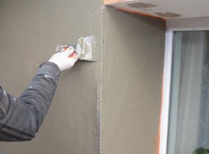 Plasterer applying best external render for your home