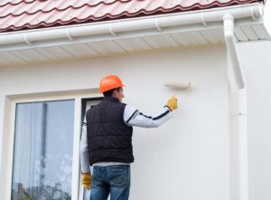 Painting exterior of a house in cold weather conditions
