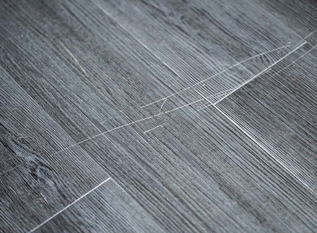 scratched vinyl floor