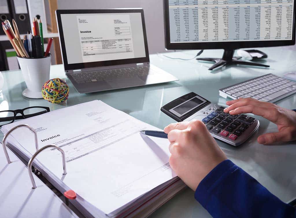 invoicing being done at a desk