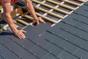 Fixing slate roof tiles
