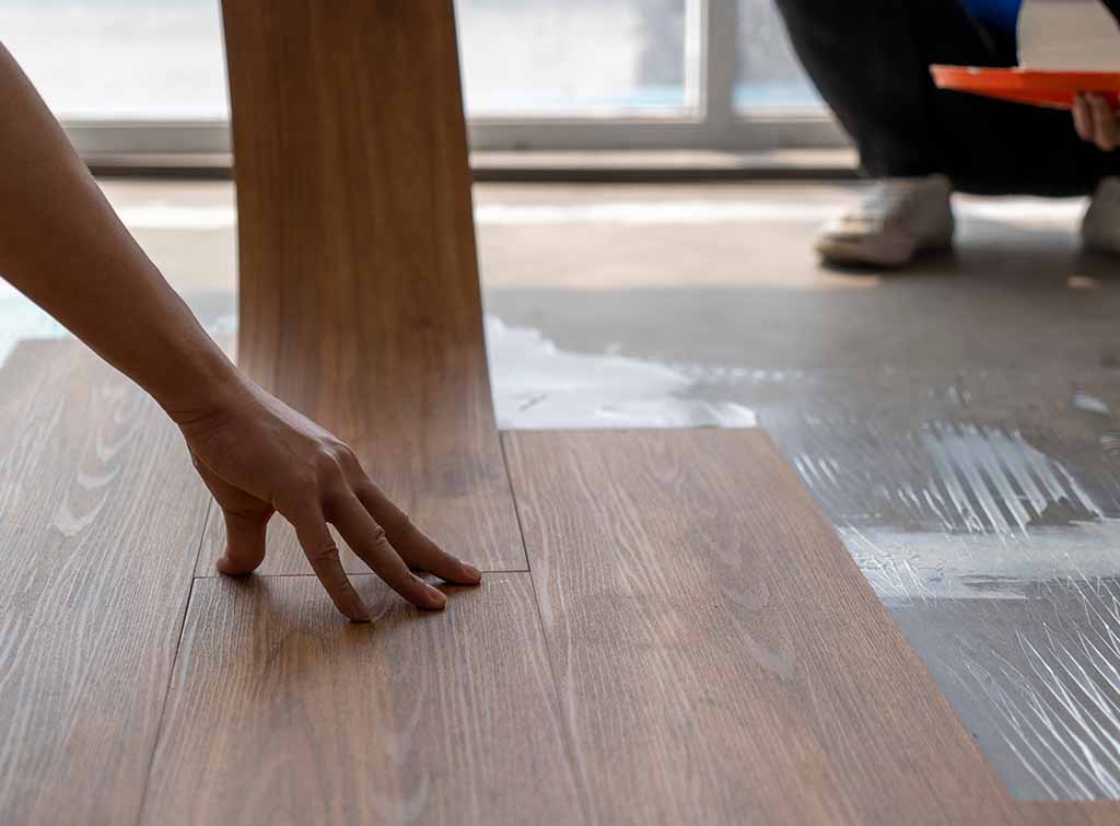 vinyl floor being installed
