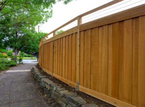Curved fence alongside a pathway