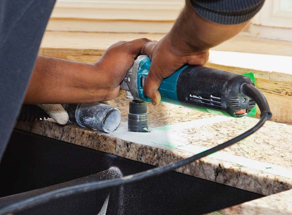 worktop fitter cutting hole in worktop