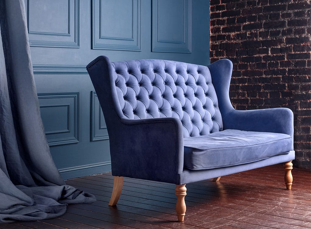 blue upholstered sofa