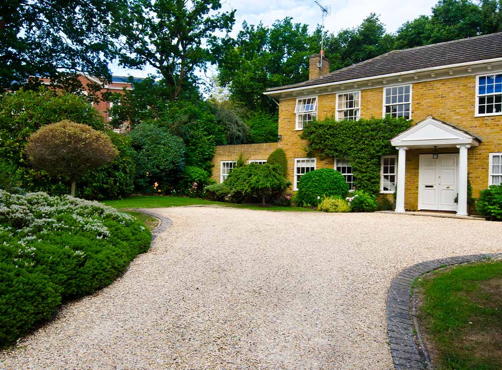 Smart driveway with house in the background
